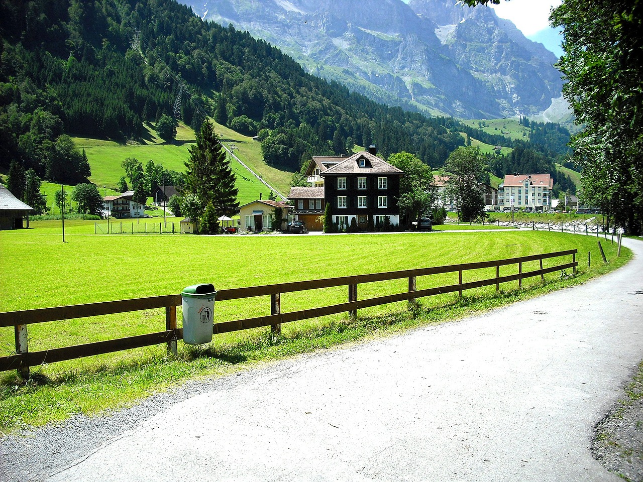 road through village, house in mountains, swiss-363359.jpg